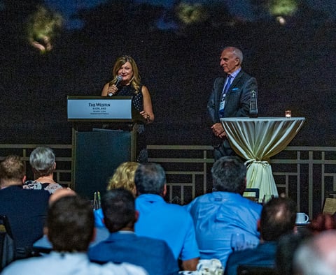 Janice Carter Larson, CLLM, Vice President of Clinical Resources and Consulting for Encompass Group (left) accepts IAHTM “2019 Lifetime Achievement” Award from IAHTM Board President Myles Noel (CEO, COMTEX).